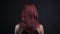 Back of woman with red hair