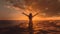 Back of woman standing in ocean at sunset