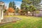 Back yard with deck and grass.