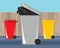 Back yard waste nd recycling bins near a wooden fence