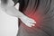 Backache injury in humans .backache pain,joint pains people medical, mono tone highlight at backache