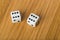 Backgammon dices on wood background