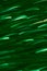 Background abstract dynamic green neon light and stripes moving fast