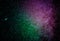 Background of abstract galaxies with stars and planets with green and purple star motifs of the universe night light space