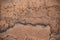 Background of adobe - close-up of mud construction from wall of an ancient pueblo structure in the American Southwest - blank