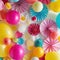 The background is adorned with an assortment of vibrant balloons