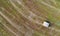 Background of agricultural field with bale of straw.