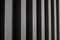 The background of alternating vertical columns of black and steel color in perspective.