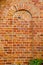 Background ancient red brick wall arch imitation
