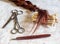 Background Antique hairdressing tool with hair braid