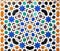 Background of arab tiles, islamic pattern mosaic. Palace of Alhambra in Granada, Andalusia, Spain