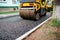 Background of asphalt roller that stack and press hot asphalt. Road repair machine