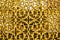 Background beautiful gilded ornamental grille gate