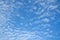 Background of beautiful stratocumulus clouds on blue sky