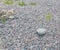 Background, big stone lying on small stones