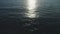 Background of the black sea water sea surface Aerial view Dark open sea in the evening at sunset or sunrise Amazing dynamic video