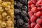 Background of blackberry, yellow and red raspberry. Fresh berries closeup. Top view. Background of fresh berries red, yellow and b