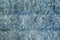 Background of blue felt fabric, texture of material with pile and thread