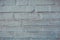 Background blue old dirty scuffed texture wall of blocks