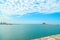 Background of blue sky with beautiful clouds and azure sea with Marina in the frame. the focus is selective