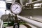 Background, blur, out of focus, bokeh. Compressor pressure gauge for pressure measurement.