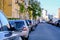 Background, blur, out of focus, bokeh. Morning soft sunlight, cars parked on the streets of the city