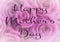 A background blur of pink roses with white vignette as a background for a mother`s day