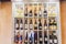 Background Blurred Defocused of wine shelf. Bottles lay over straw. Wine cellar. Defocused Blurry