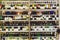 Background Blurred Defocused of wine shelf. Bottles lay over straw. Wine cellar. Defocused Blurry