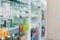 Background of blurred qualified pharmacy abstract background with drugs on shelf