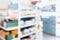 Background of blurred qualified pharmacy abstract background with drugs on shelf