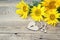 Background with bouquet of yellow sunflowers, lock-heart and key
