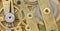 Background from brass mechanical clock movement