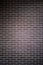 Background of a brick dark wall, tile texture with a smooth pattern.