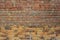 Background of brick wall texture. Old grunge outdoor orange stone texture, english brick wall