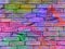 Background bricks wall. Pink, blue and other vibrant colors
