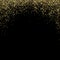 Background of bright glowing gold dust on black. Abstract background gold glitters