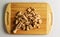 Background of brown unrefined sugar. Healthy food concept. Cane sugar on a wooden cutting board background