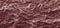 Background burgundy crumpled paper panorama
