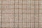 Background from checkered brown woolen fabric