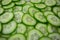 Background of chopped fresh cucumbers for the kitchen