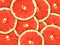 Background with citrus-fruit of grapefruit slices