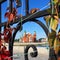 background city view of the new puppet theater on the embankment of Yoshkar-Ola, framed by the cast-iron fence