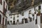 Background cityscape amazing white houses in the cliff in the village of Setenil de las Bodegas in Andalusia