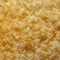 Background with a close-up of the surface of potato chips with a strong increase in soft focus