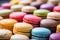 background closeup multicolored bright cakes macaroons selective focus
