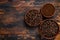 Background of coffee beans and grinded ground coffee. Dark wooden background. Top view. Copy space