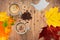 Background of coffee, cappuccino, sugar, milk, cookies on the table. Autumn, fall leaves.