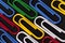 Background with colored paperclips