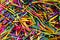 Background of colored sticks and tacks create an origami of cheerful and colorful colors.